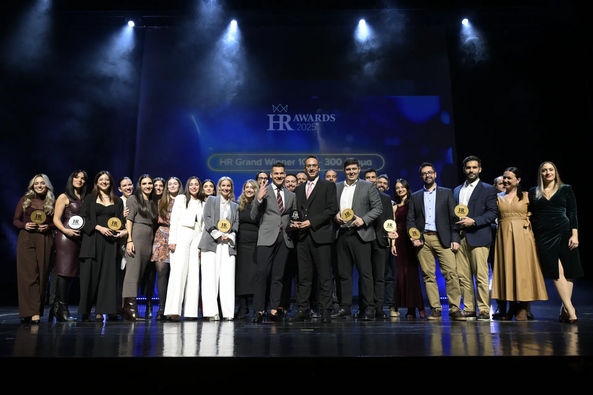Group of winners at HR Awards 2025 ceremony on stage
