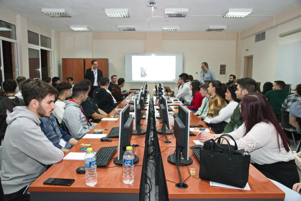 Students attending a university computer lab lecture session